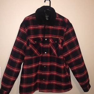 Red and black striped fur jacket